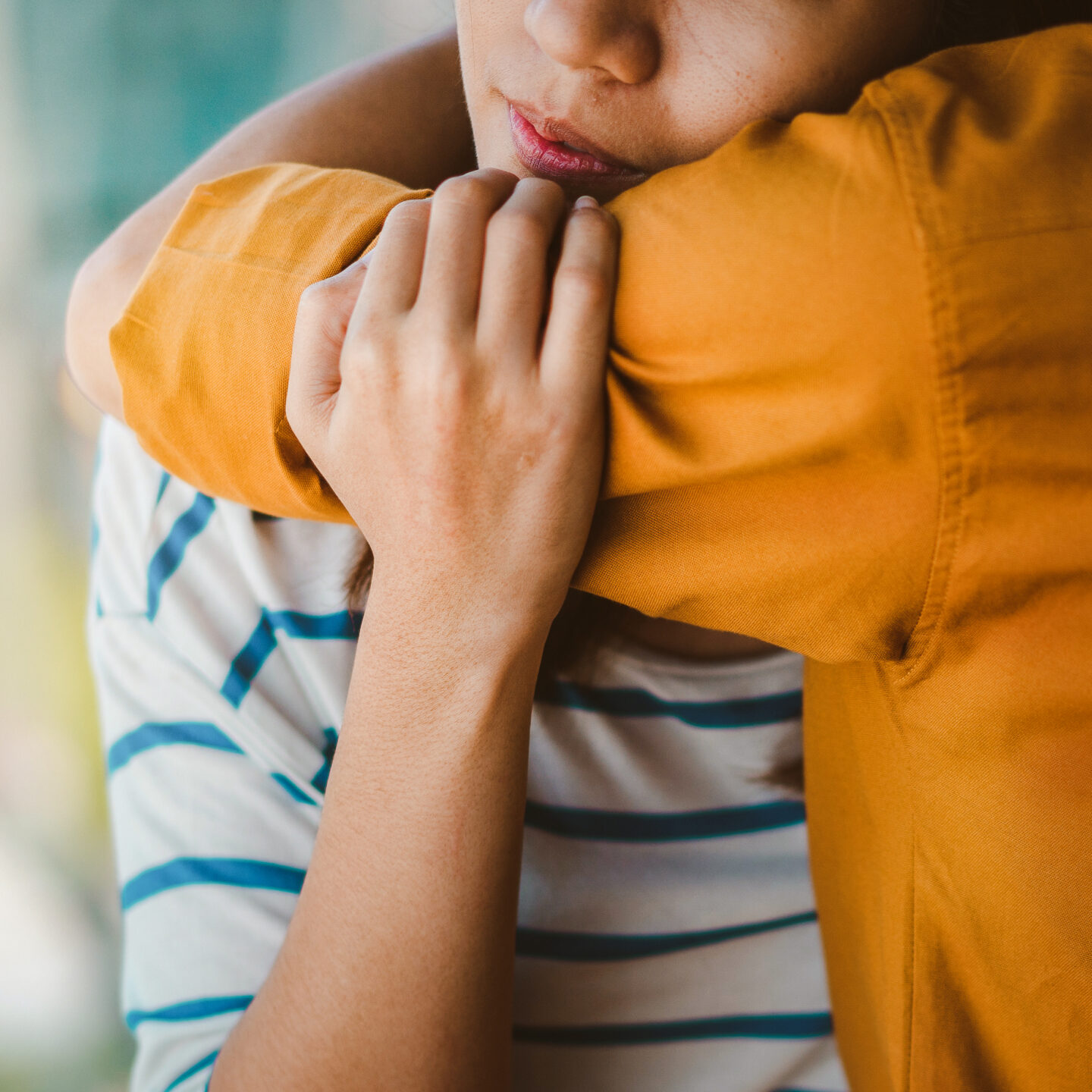 Young depressed person hugging their friend for encouragement, Selective focus, PTSD Mental health concept.