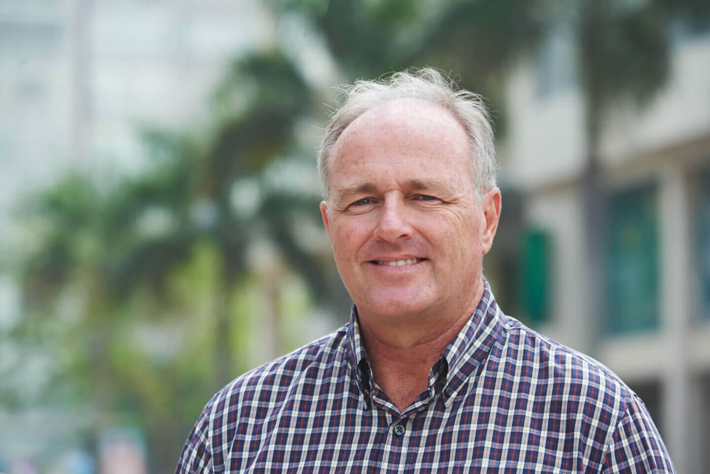 Portrait of person smiling outdoors