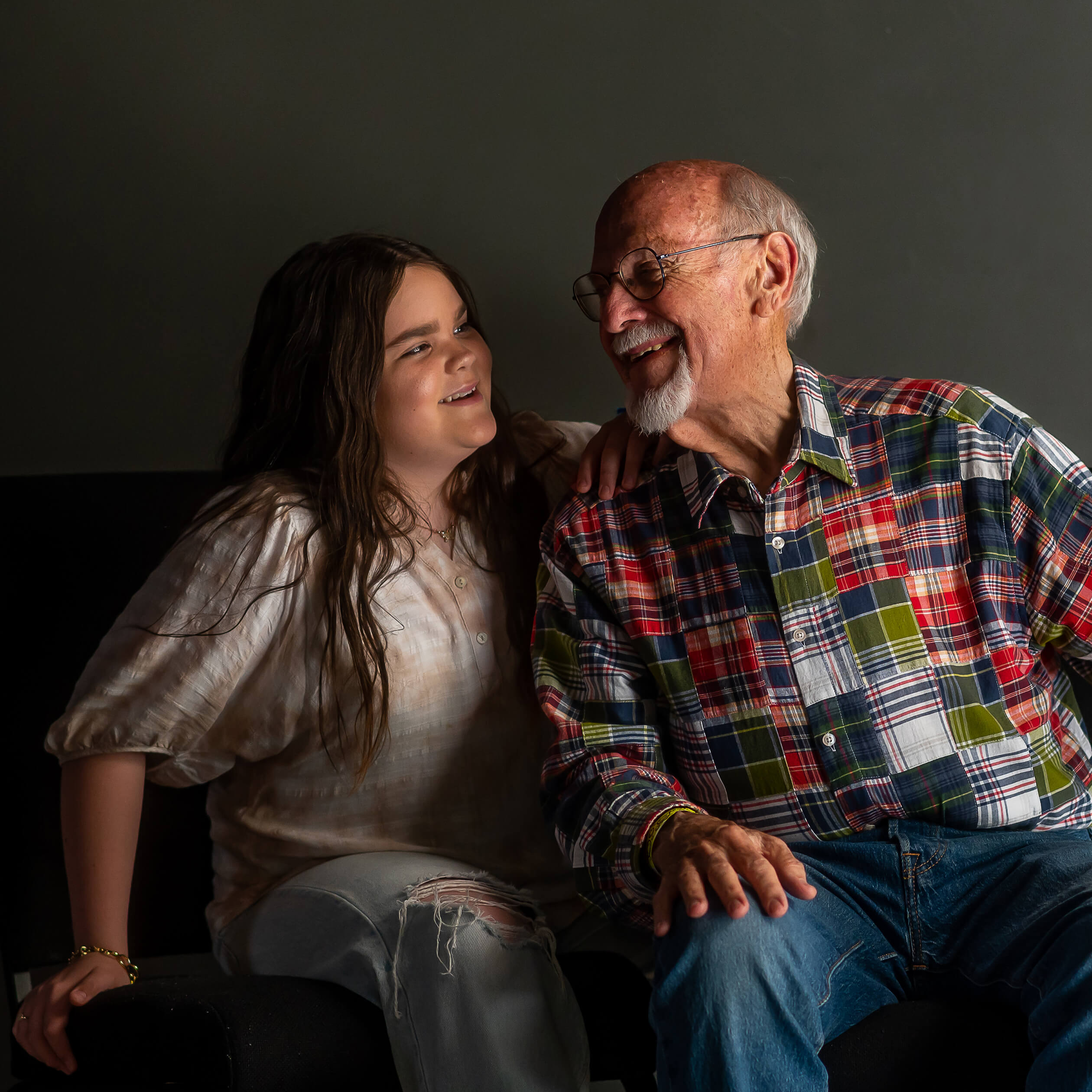 No text. Photo of Skylar looking at her grandpa.